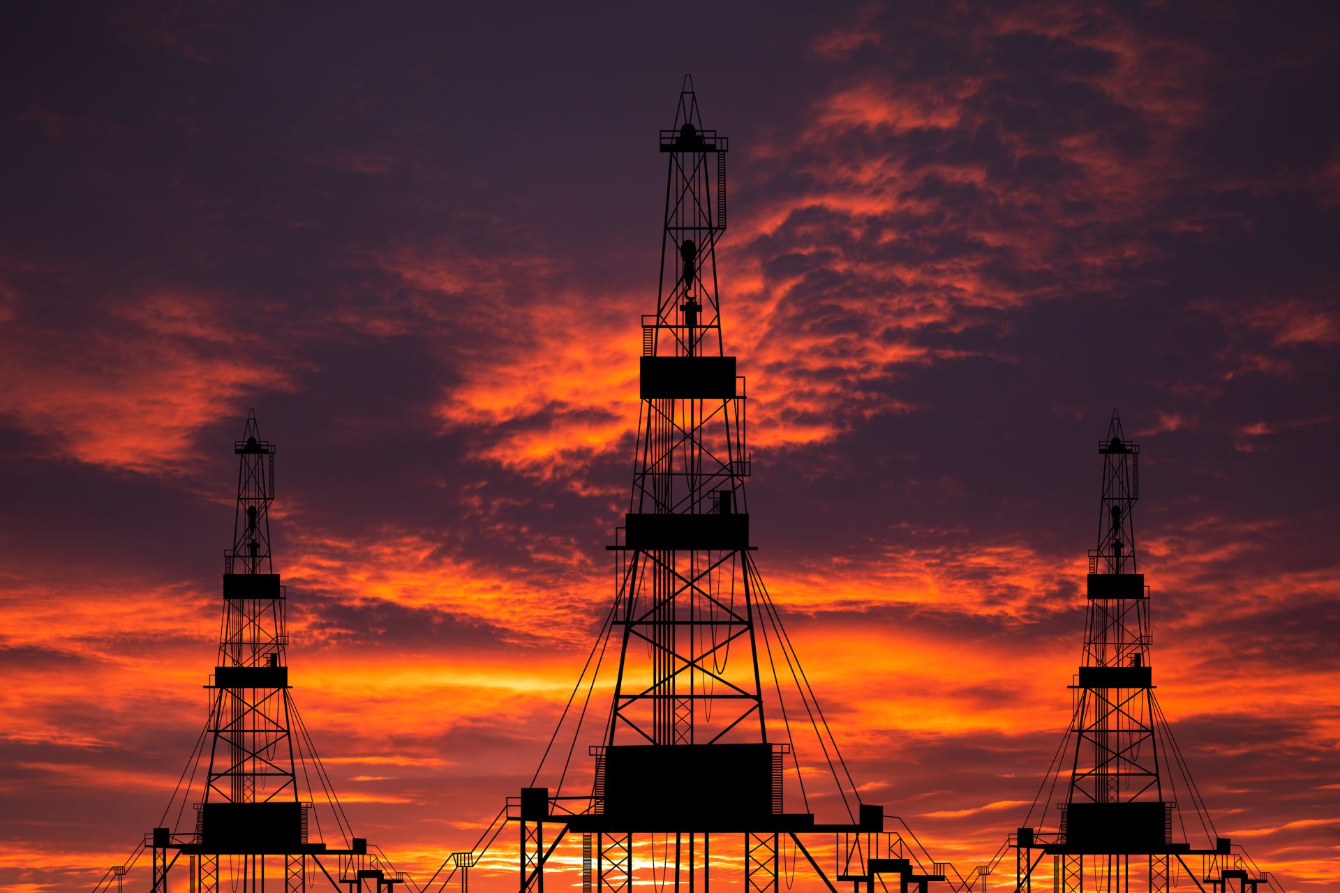 oil-pump-on-a-sunset-background-world-oil-industr-2023-11-27-04-57-24-utc