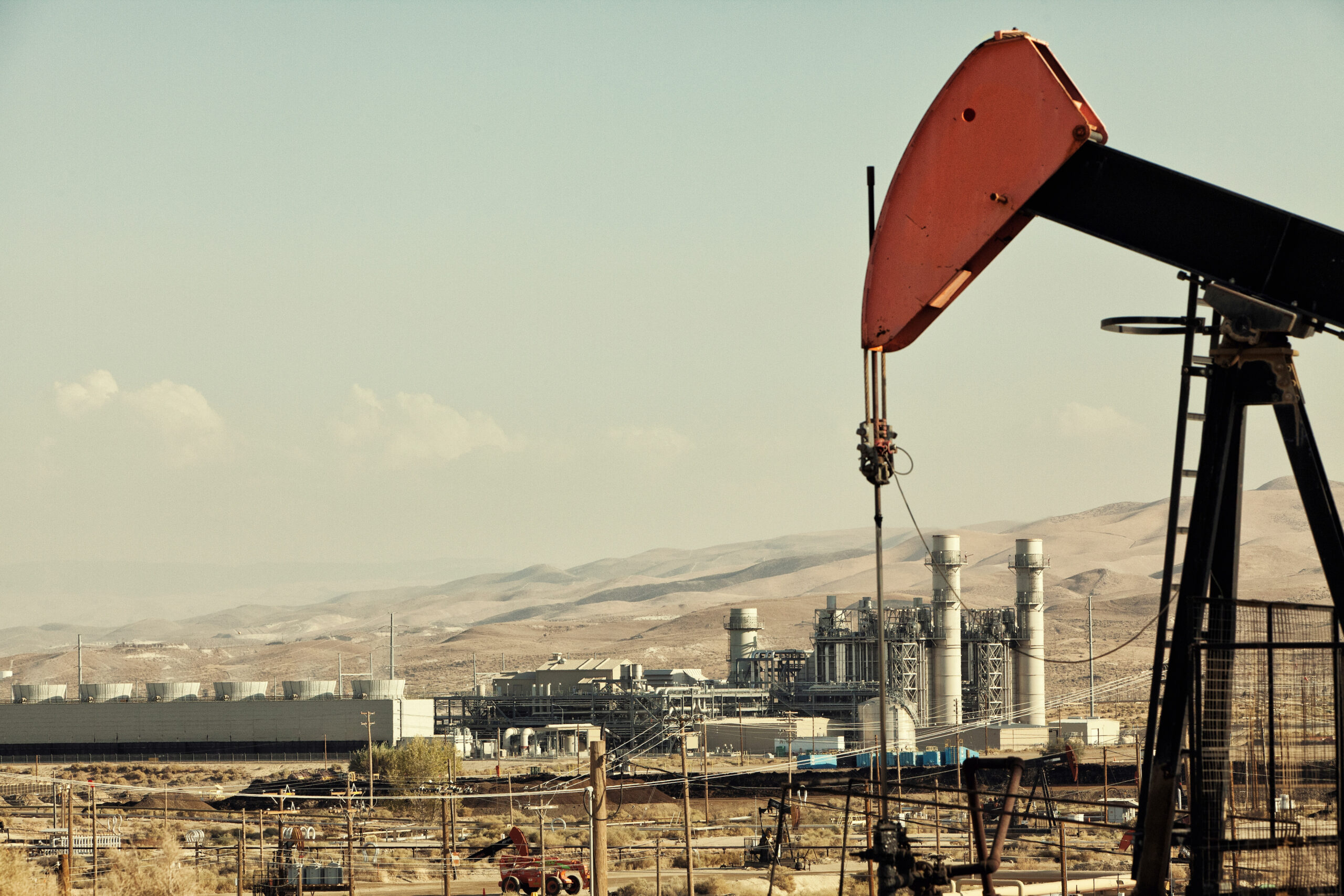 Oil pump and refinery in oil field